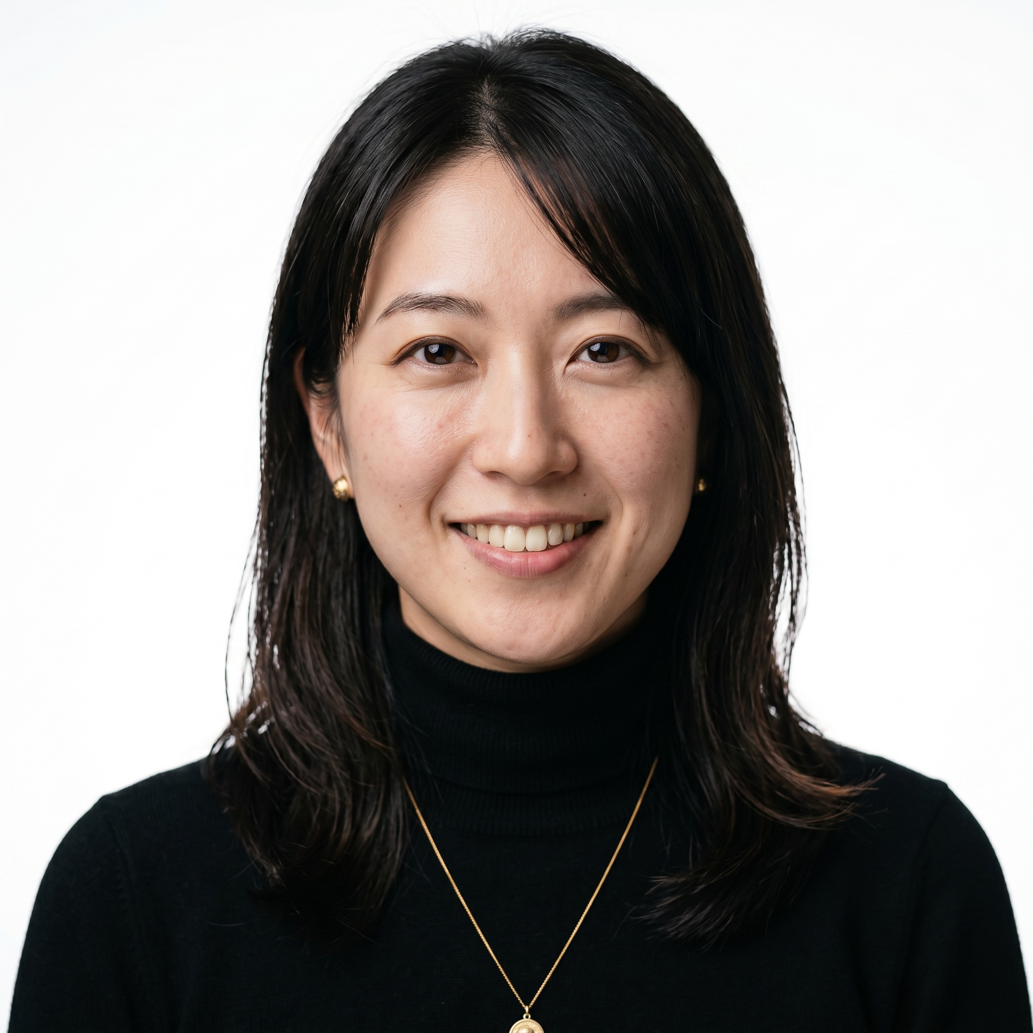White / Pure White Studio · Fitted black turtleneck headshot example