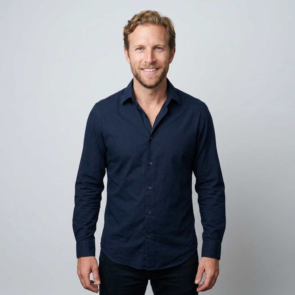 Soft White to Light Grey Studio · Navy Button-Up with Dark Trousers headshot example